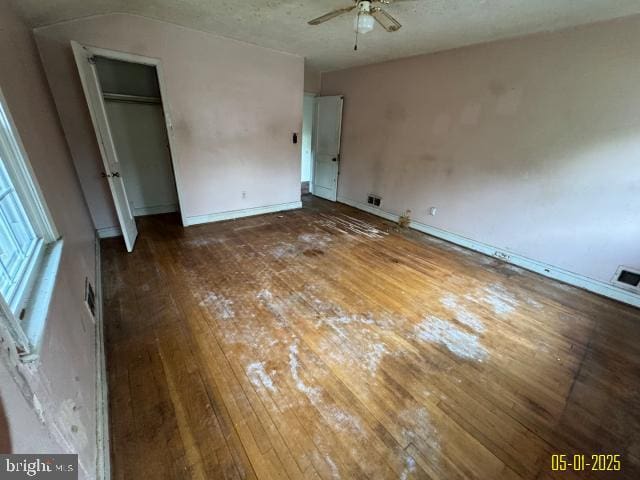6410 Laurel Dr, Gwynn Oak, MD 21207 - unfurnished bedroom with hardwood / wood-style flooring, a closet, and baseboards
