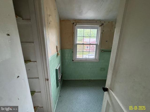 6410 Laurel Dr, Gwynn Oak, MD 21207 - interior space featuring wainscoting, tile patterned floors, tile walls, and heating unit