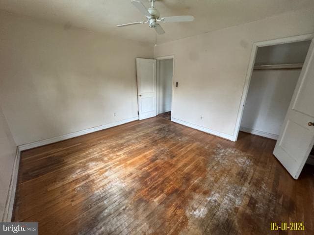6410 Laurel Dr, Gwynn Oak, MD 21207 - unfurnished bedroom with hardwood / wood-style floors, baseboards, a closet, and ceiling fan