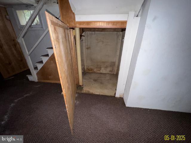 6410 Laurel Dr, Gwynn Oak, MD 21207 - basement with carpet and stairs