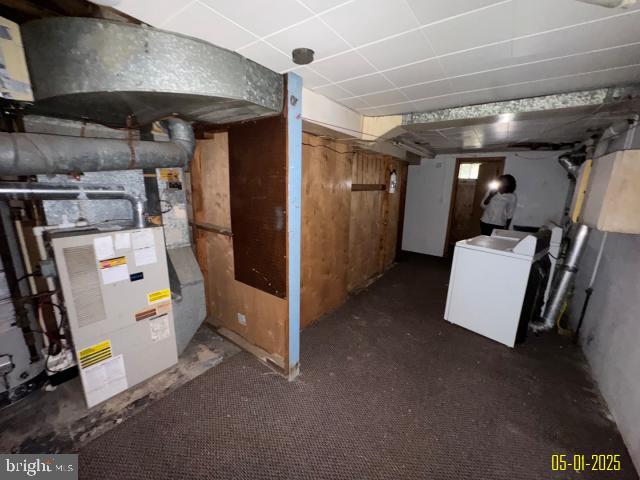6410 Laurel Dr, Gwynn Oak, MD 21207 - basement featuring washer / dryer and a paneled ceiling