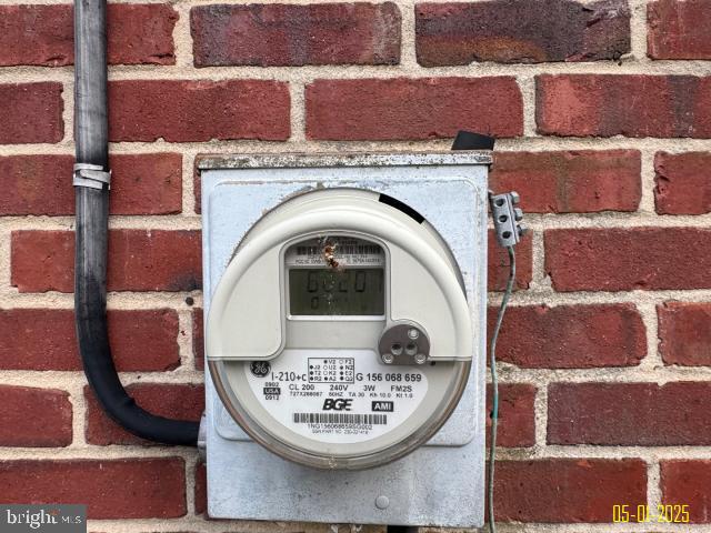 6410 Laurel Dr, Gwynn Oak, MD 21207 - exterior view of electric meter and brick siding