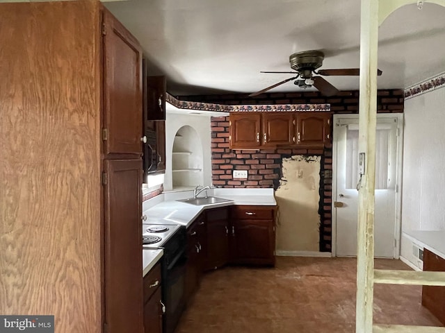 kitchen with ceiling fan, electric range oven, and sink