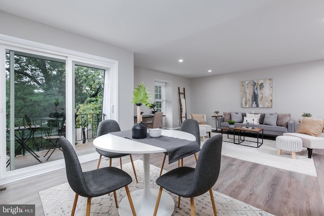 dining room featuring light wood-type flooring