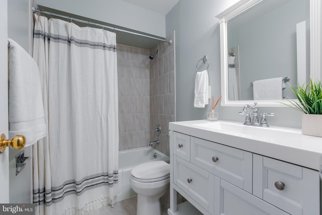 full bathroom with vanity, toilet, and shower / bathtub combination with curtain