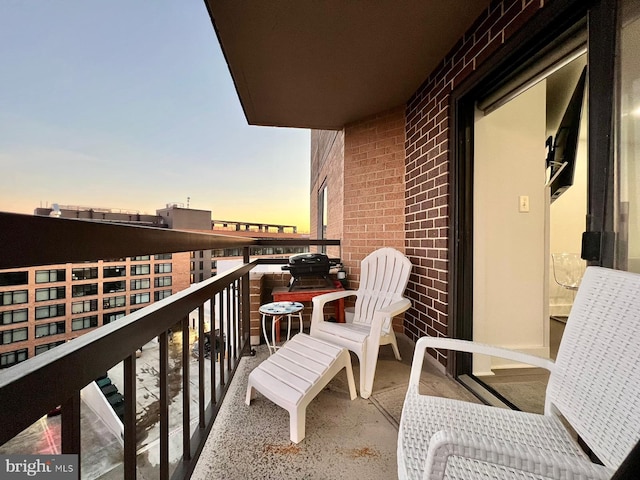 view of balcony at dusk