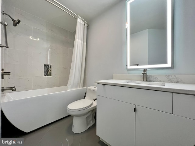 full bathroom featuring toilet, shower / bath combo, vanity, and tile patterned floors