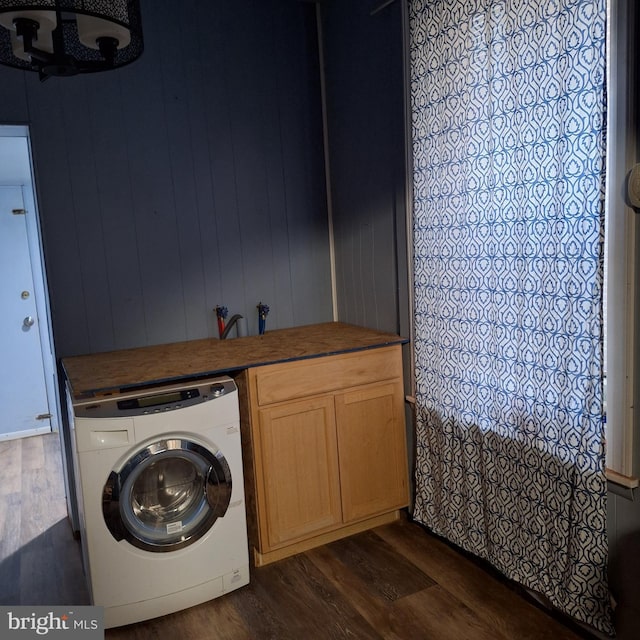 washroom featuring washer / dryer and dark hardwood / wood-style floors