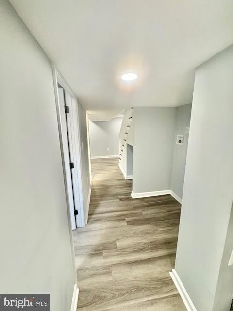 corridor featuring light hardwood / wood-style floors