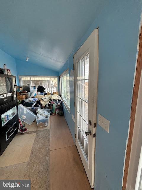 bedroom with lofted ceiling