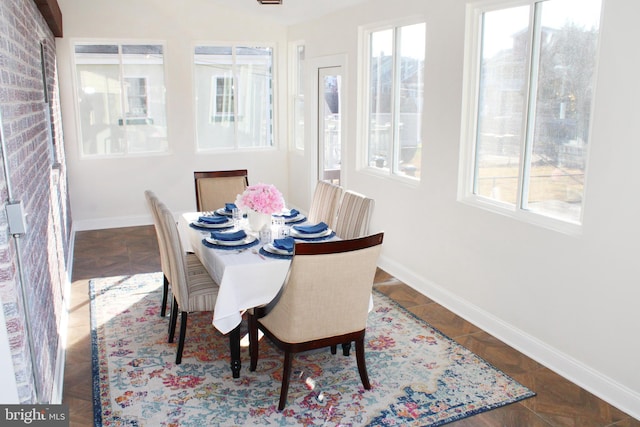 dining area featuring a healthy amount of sunlight