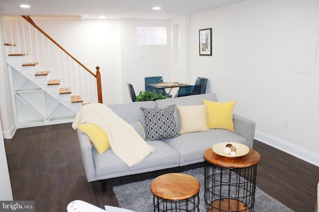 living room featuring dark hardwood / wood-style flooring