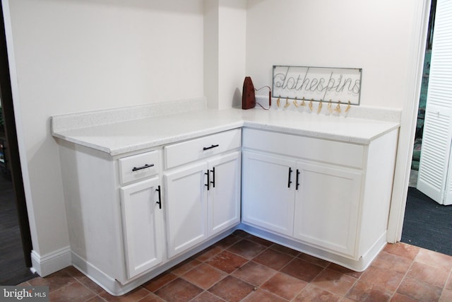 kitchen with white cabinetry