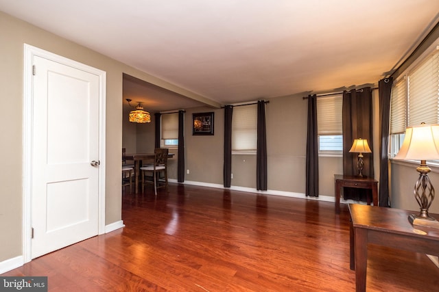 living room featuring dark hardwood / wood-style floors