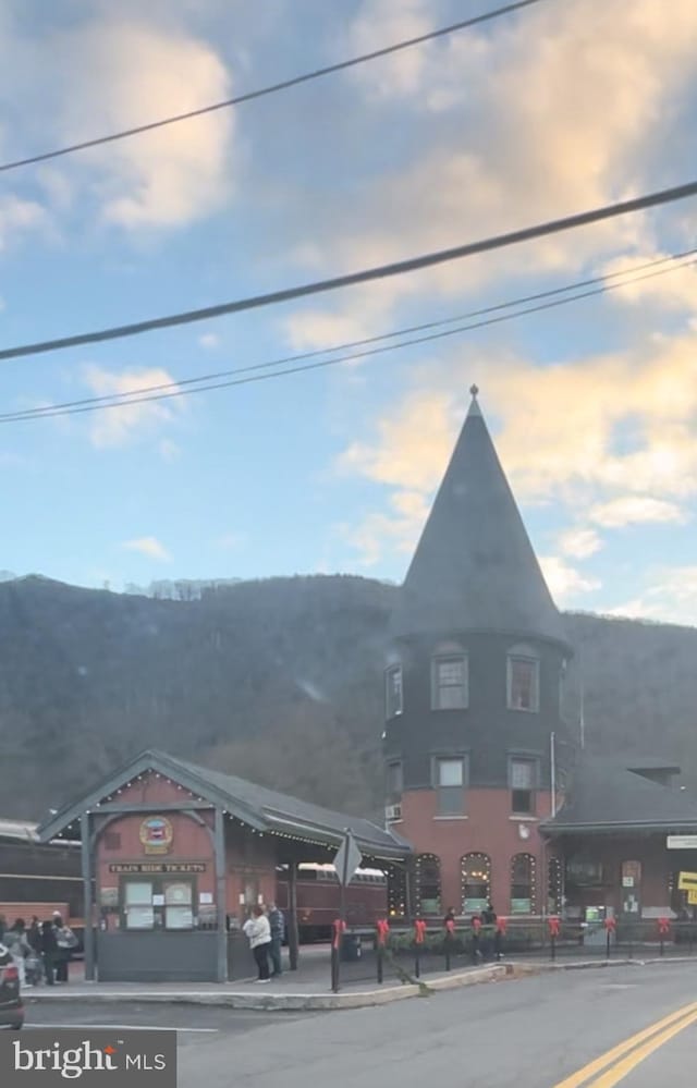 exterior space featuring a mountain view