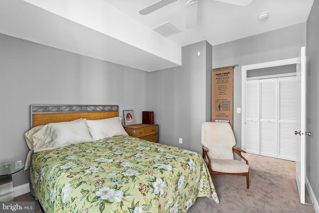 bedroom with carpet flooring, ceiling fan, and a closet