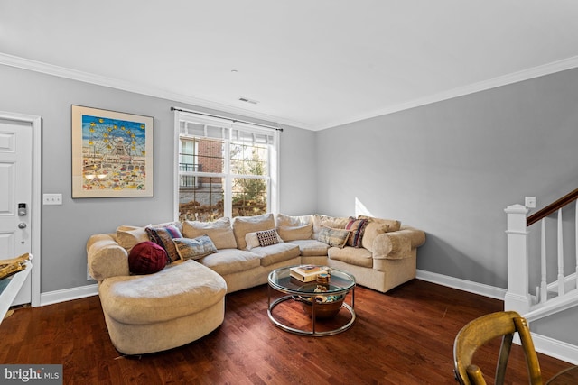 living room featuring dark hardwood / wood-style flooring and ornamental molding