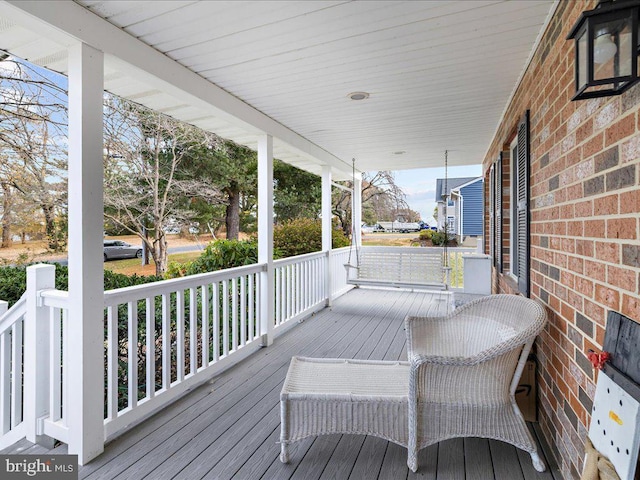 wooden deck featuring a porch