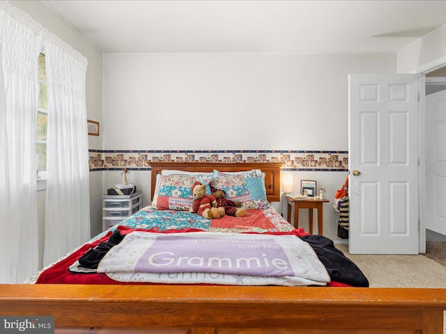 bedroom featuring carpet