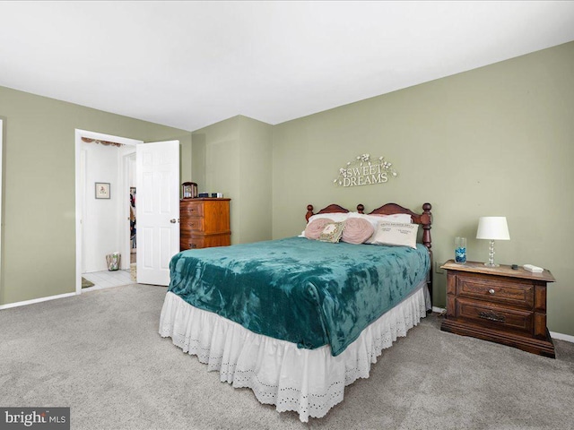 bedroom with light carpet