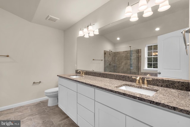 bathroom featuring vanity, toilet, an enclosed shower, and vaulted ceiling