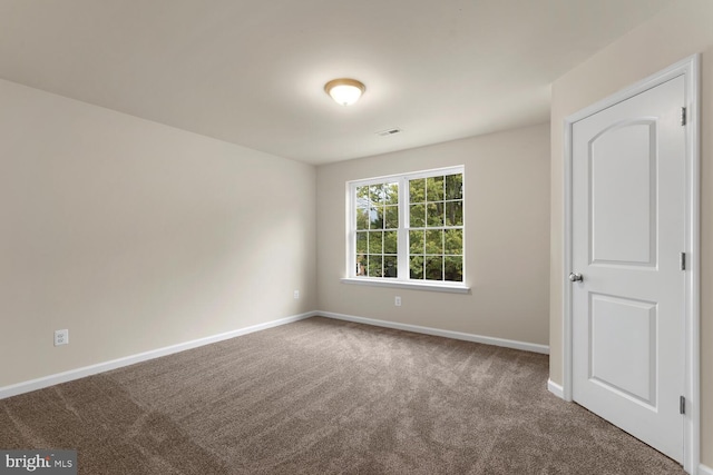 view of carpeted spare room