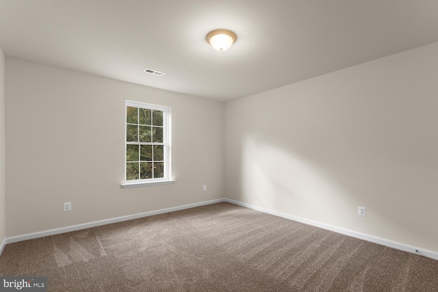 view of carpeted spare room