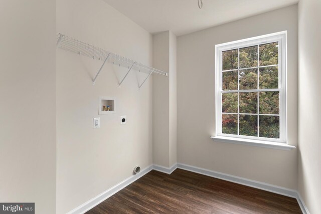 clothes washing area with hookup for a washing machine, dark wood-type flooring, and electric dryer hookup