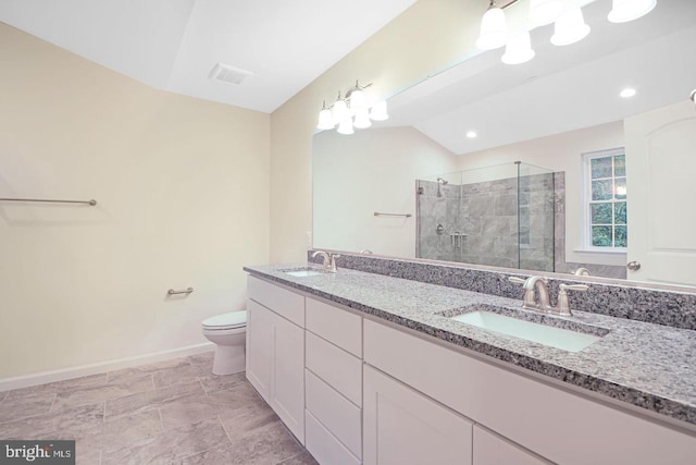 bathroom with vanity, toilet, an enclosed shower, and vaulted ceiling