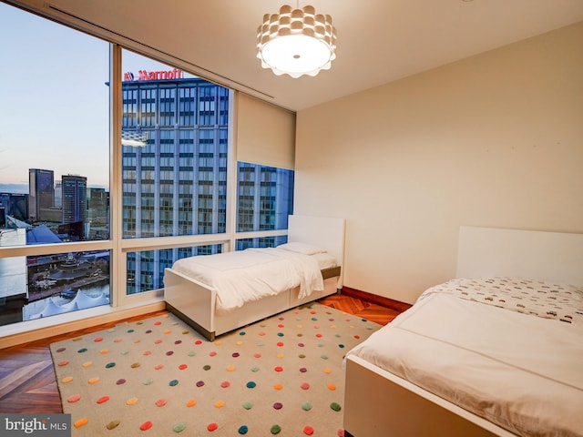 bedroom with parquet flooring