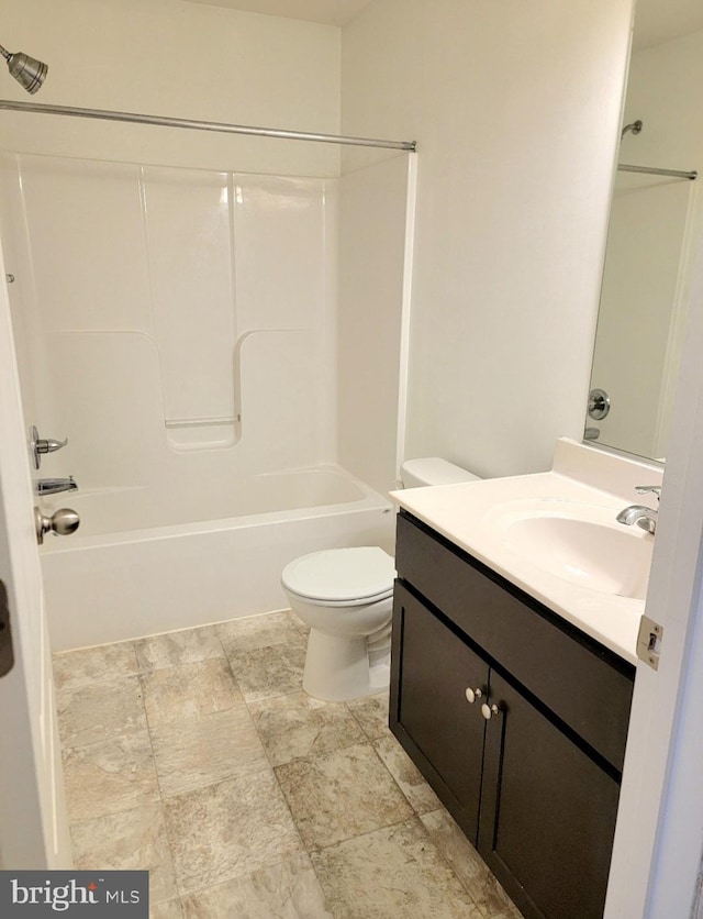 full bathroom featuring vanity,  shower combination, and toilet