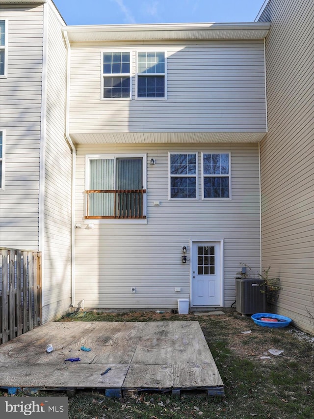 back of property featuring a patio area and central AC