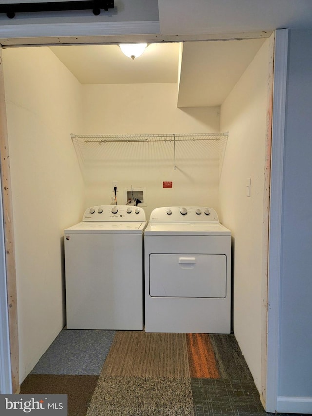 laundry area with washer and dryer