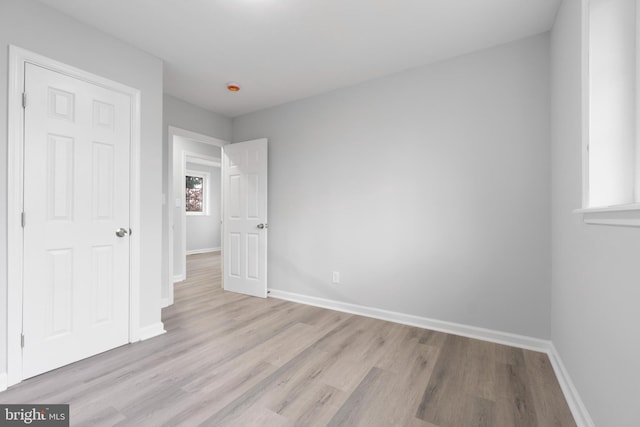 unfurnished bedroom featuring light hardwood / wood-style flooring