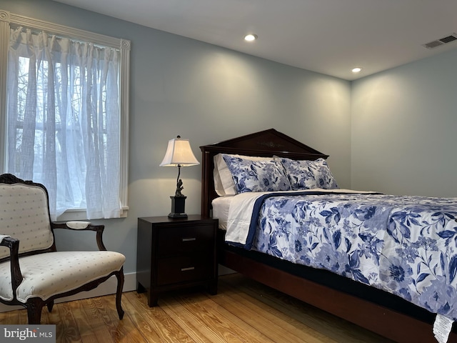 bedroom featuring light hardwood / wood-style floors