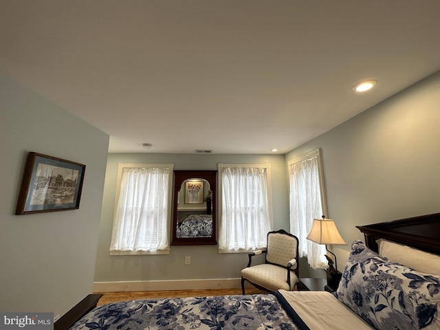 bedroom featuring light hardwood / wood-style floors