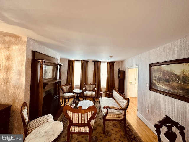 sitting room with light hardwood / wood-style flooring