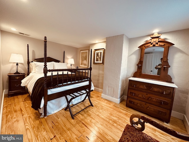 bedroom featuring light wood-type flooring