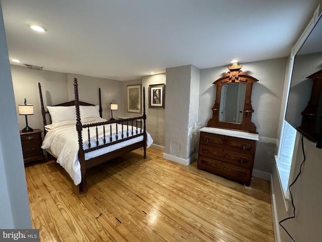 bedroom featuring light hardwood / wood-style flooring