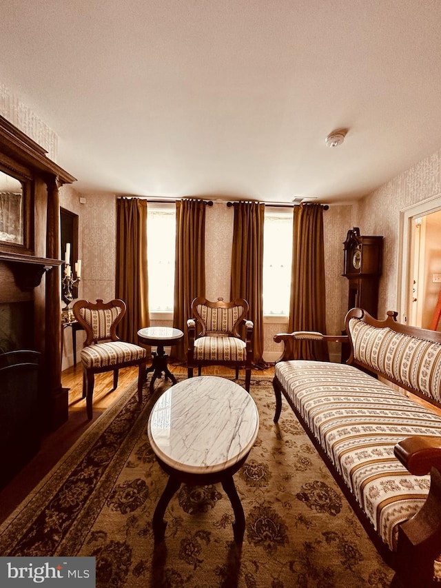 sitting room featuring a textured ceiling