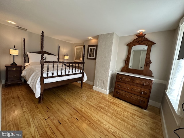 bedroom featuring light wood-type flooring