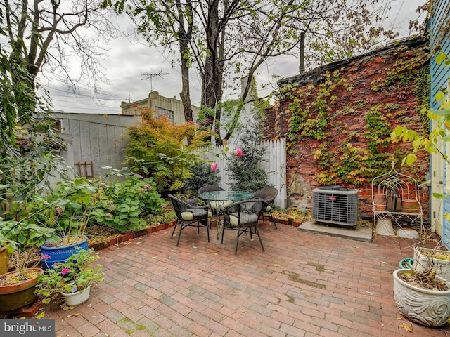 view of patio with central AC