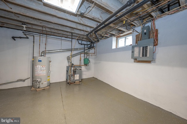 17 Elm Ave, Upper Darby, PA 19082 - basement with water heater, a heating unit, and electric panel