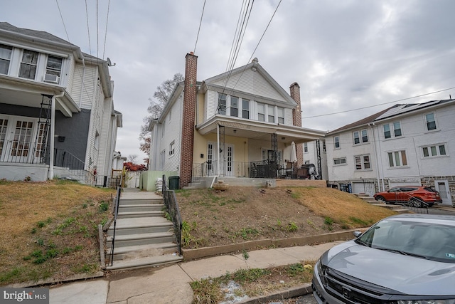 17 Elm Ave, Upper Darby, PA 19082 - view of front facade featuring covered porch and stairs