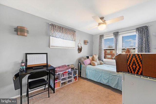 carpeted bedroom featuring ceiling fan