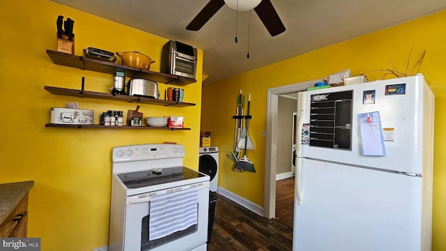 kitchen with ceiling fan, dark hardwood / wood-style flooring, and white appliances