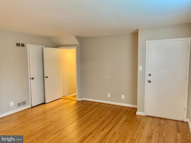 empty room featuring light hardwood / wood-style floors