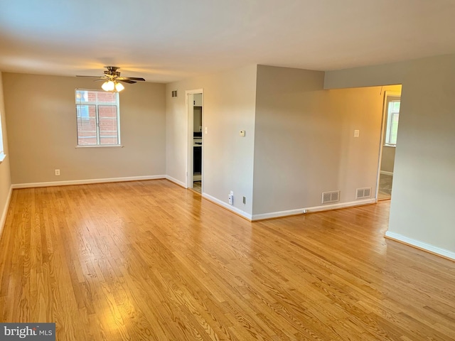 unfurnished room with light hardwood / wood-style floors and ceiling fan