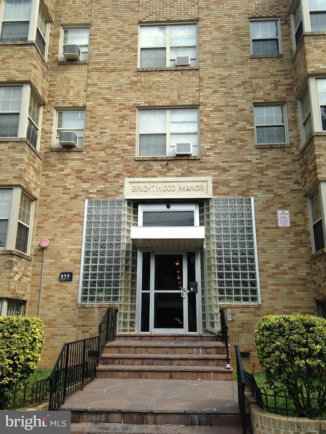 property entrance with cooling unit