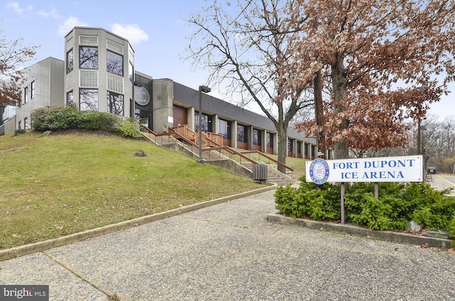 view of building exterior with central AC unit